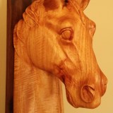 carved horse head from honduran cedar wood finished with oil and beeswax made to be wall mounted