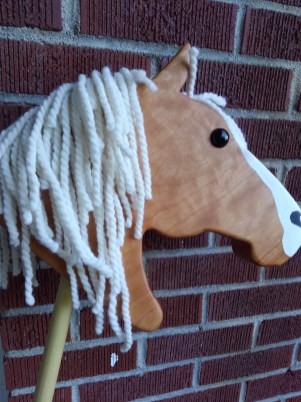 wooden stick horse painted white blaze cherry wood white yarn mane