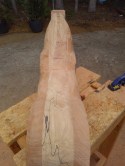 body of wood rocking horse shown from above to show contour of carved body and neck