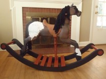 brown and white spotted appaloosa rocking horse