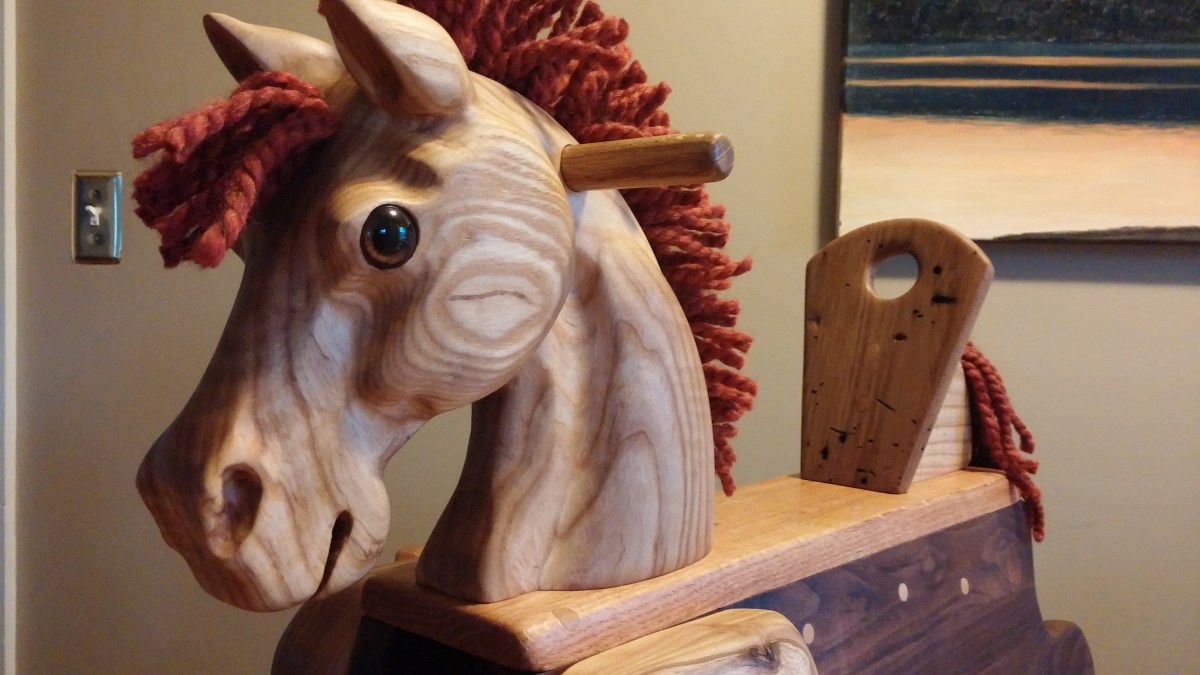 hand carved oak rocking horse with reclaimed lumber