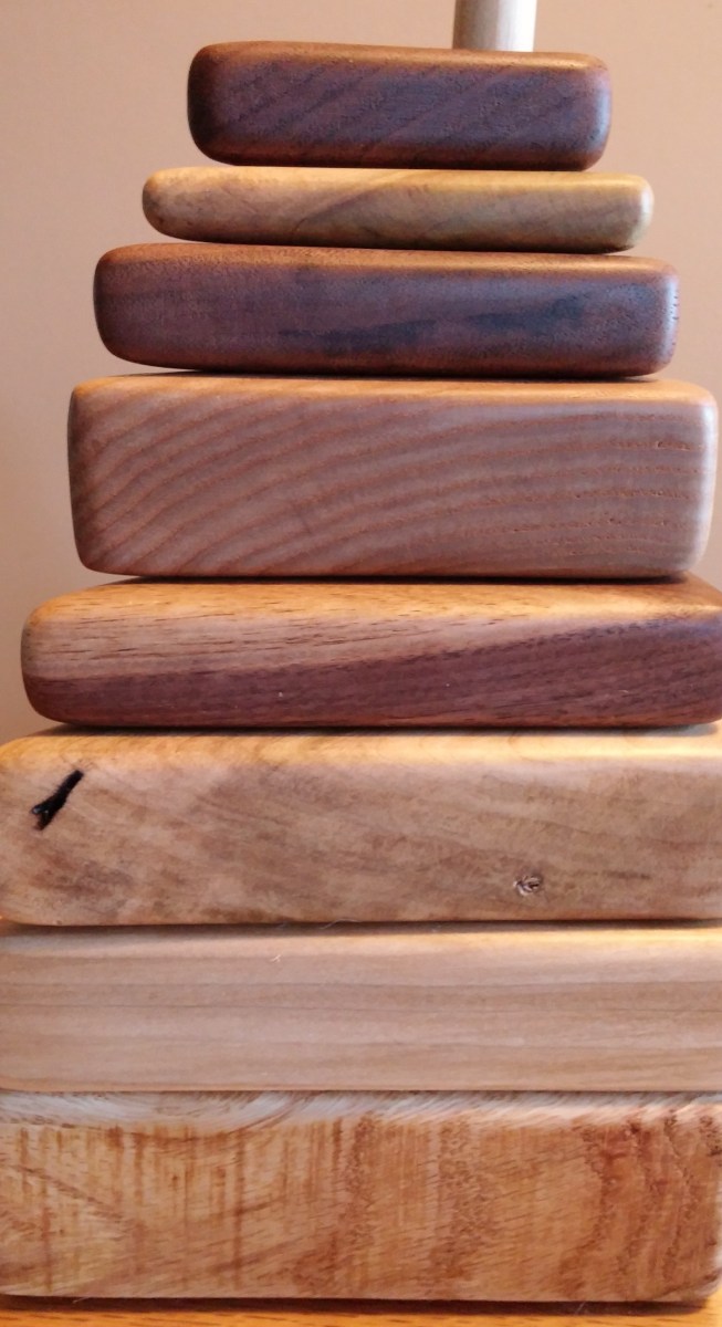 hand made stacking triangles from reclaimed lumber