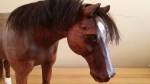 carved walnut quarter horse real horse hair white blaze bay head view