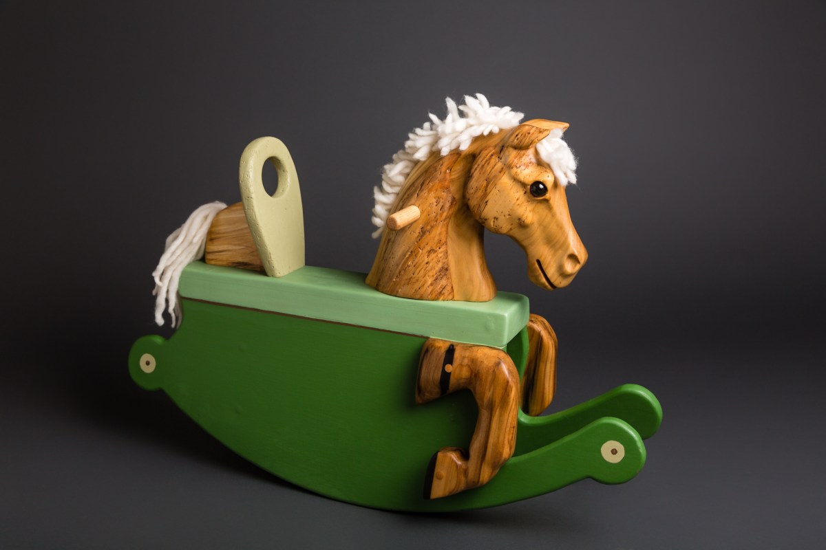 carved reclaimed poplar toddler rocking horse painted green rockers wool mane and tail glass eye