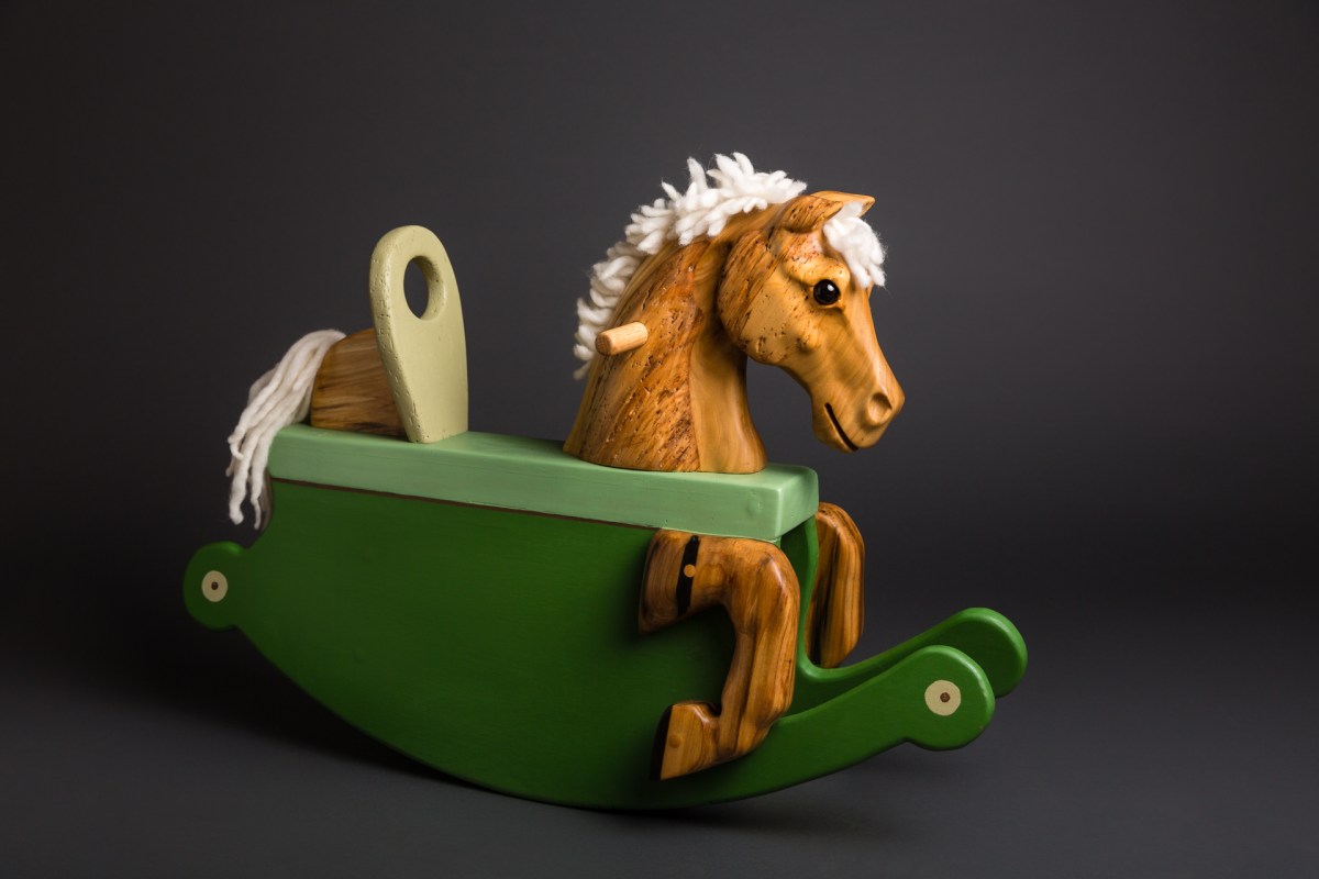 carved reclaimed poplar toddler rocking horse painted green rockers wool mane and tail glass eye