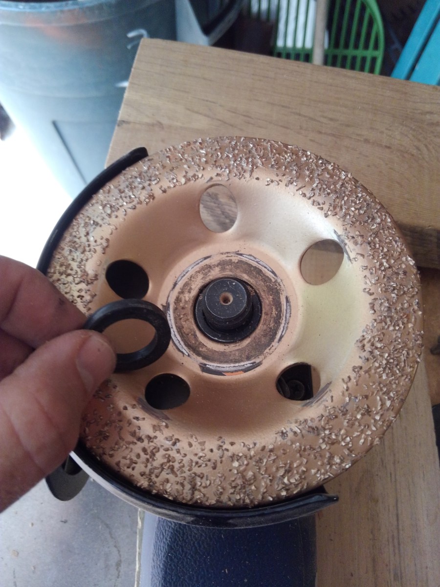 rubber washer shown next to power carving head from harbor freight